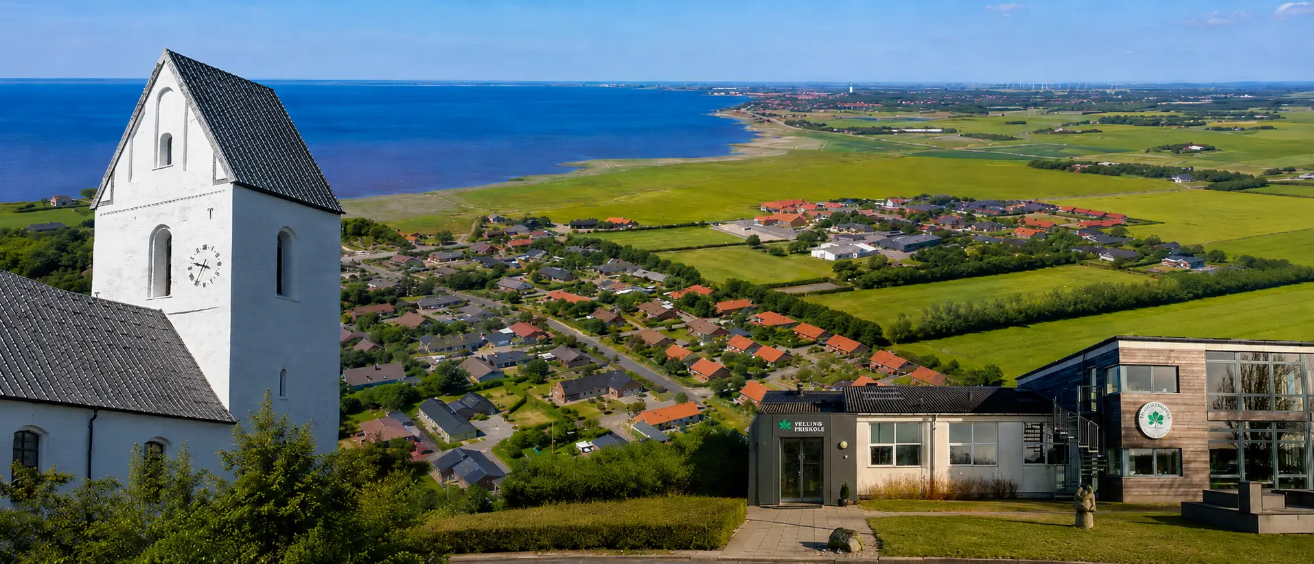 Velling Kirke med udsigt over Ringkøbing Fjord og Velling Kirkeby